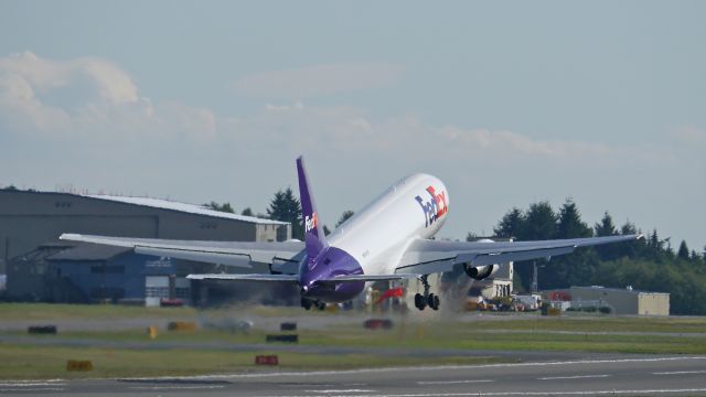 BOEING 767-300 (N107FE) - BOE561 on rotation from Rwy 16R to begin its first flight test on 9/19/14. (LN:1___ / cn 44377).