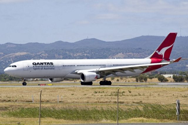 Airbus A330-300 (VH-QPD) - On to the taxi-way, heading for Terminal 1, after landing on runway 23 on arrival from Sydney en-route to Singapore, on the last day of the Australian summer. Thursday 28th February 2013.