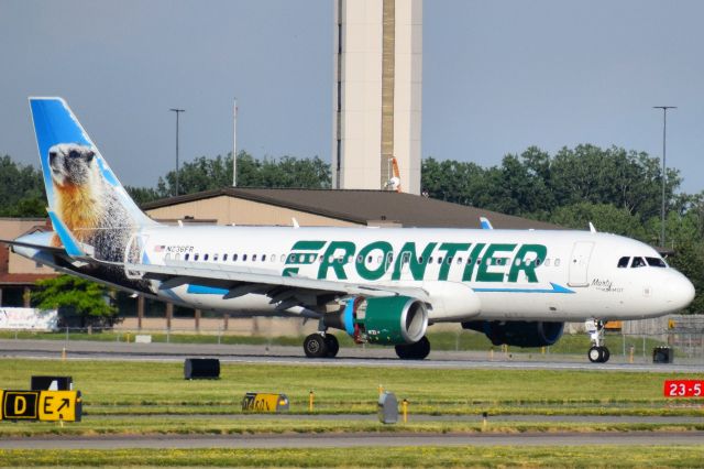 Airbus A320 (N236FR) - "Marty the Marmot" arriving into the Buffalo Niagara International Airport from Orlando (MCO)