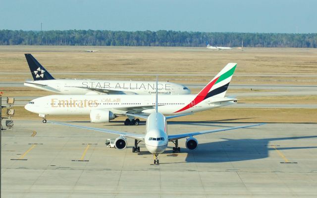 — — - A mix of Boeing aircraft at IAH.