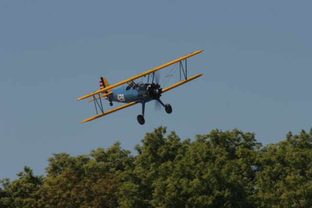 — — - Low Approach Over the Trees at the Pioneer Airport EAA Oshkosh Grounds