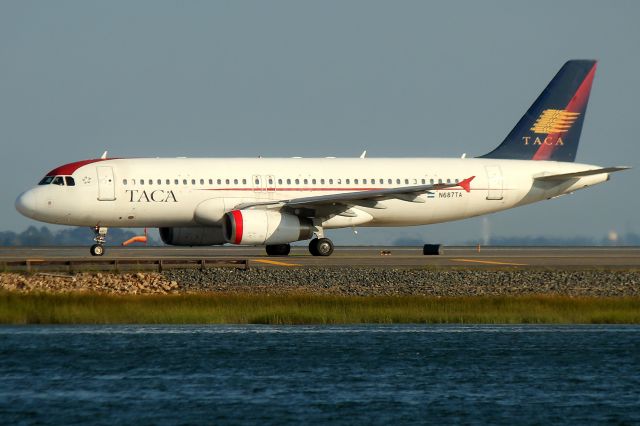 Airbus A320 (N687TA) - Taca 445, subbing for Avianca, departing for San Salvador