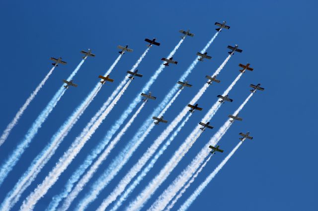 Vans RV-12 — - Flight of 24 crossing mid field at Oshkosh.  