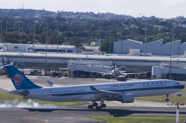 Airbus A330-300 (B-5940) - Touching down on 16R