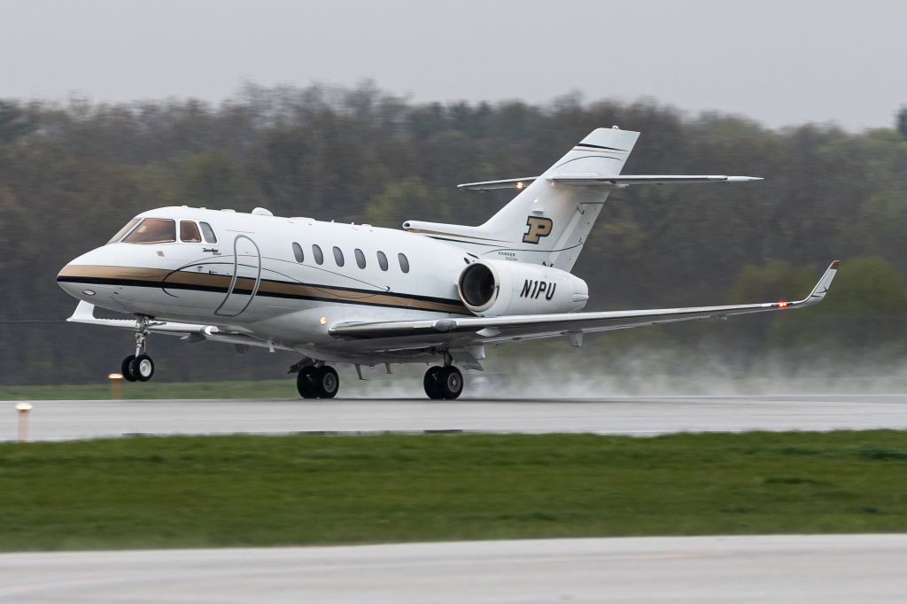 Hawker 800 (N1PU) - Purdue's Hawker 900XP rotating off of 10 in some rainy/snowy conditions in April, bound for a slightly less formidable Tennessee.