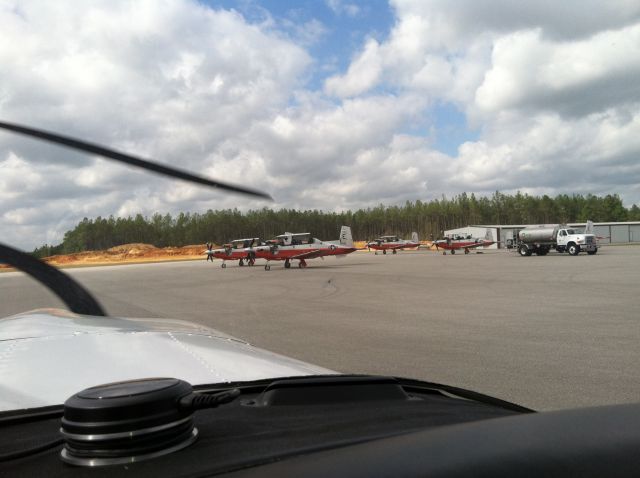 Piper Saratoga (N608TM) - Bay Minette AL,,,cheapest fuel @,,,,Navy boys like bees but worth it when the all girl flight line takes care of ya w/a smile!