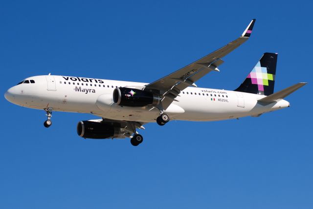 Airbus A320 (N525VL) - N525VL arriving from Guadalajara, Jalisco as Volaris 1931. This plane is less than two months old.