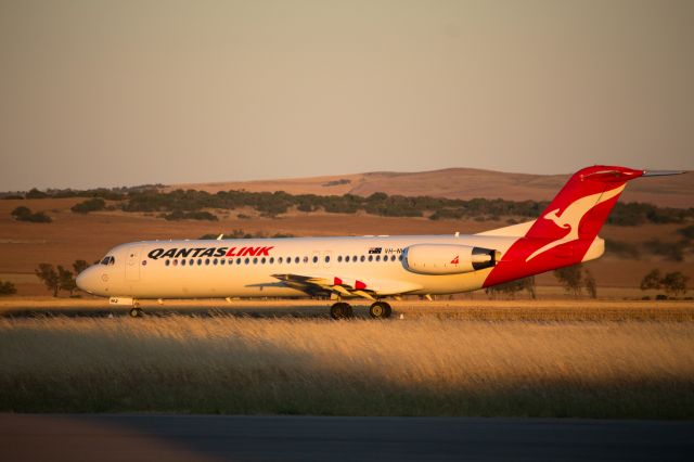 Fokker 100 (VH-NHJ) - NHJ taxiing to the end of RW21 at Geraldton Airport to line up for take-off back to to Perth.