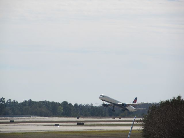 BOEING 757-300 (N589NW) - From gate 128 in KMCO terminal