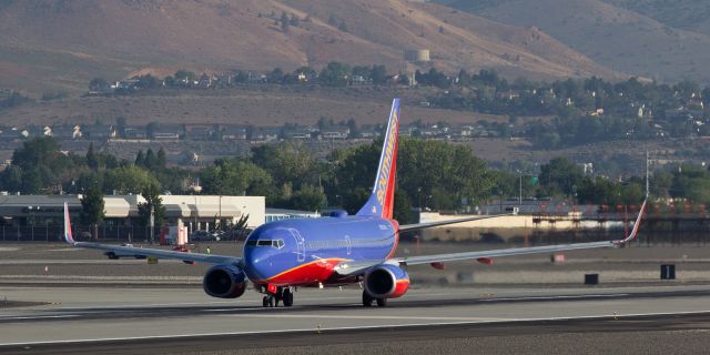 Boeing 737-700 (N797MX) - Ready, set, and waiting to go.  This long distance click shows Southwests N797MX positioned on Reno Tahoe Internationals runway 16L and awaiting takeoff clearance for a morning departure.