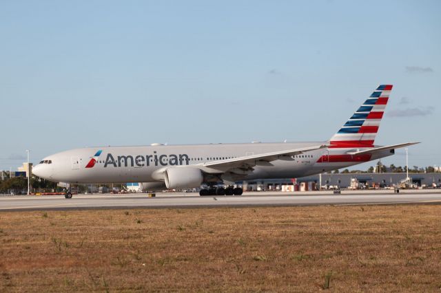 Boeing 777-200 (N779AN) - Taxing at the airport of Miami on the 3rd of April,2018.