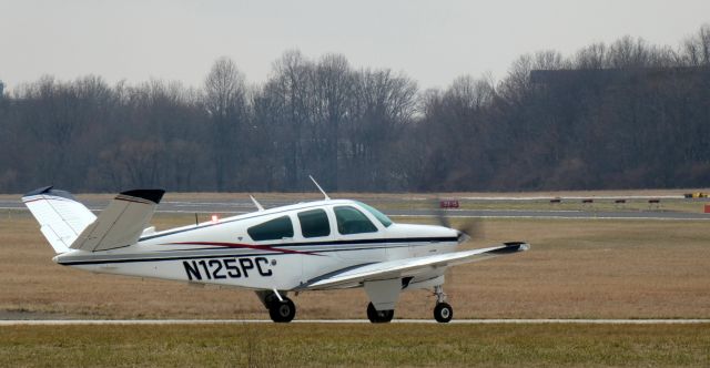 Beechcraft 35 Bonanza (N125PC) - Taxiing for departure is this 1978 V35B Bonanza in the Winter of 2024.