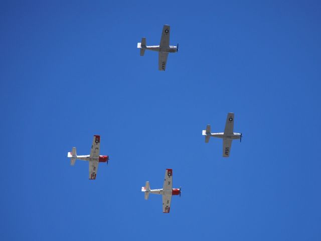 — — - Flying over Huntersville, NC. In town for T-28 Formation Flying Training Clinic at JQF - 4/11/10