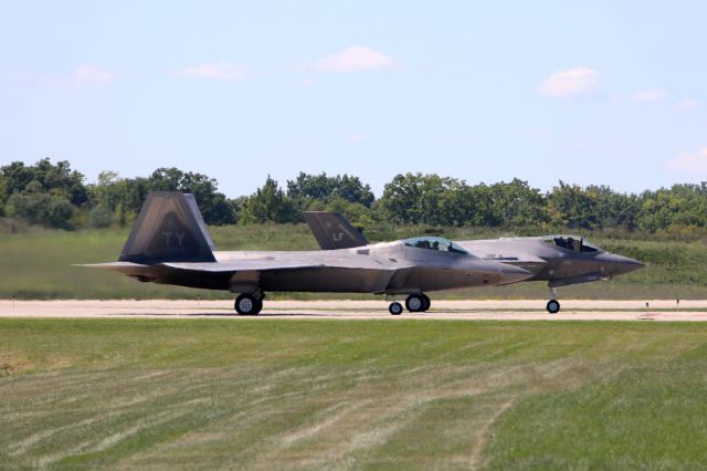 Lockheed F-22 Raptor (05-4104) - A USAF Lockheed Martin F-22A Raptor, 05-4104, cn 645-4104, from the USAF Air Combat Command (ACC) Demo Team from Joint Base Langley-Eustis (JBLE), VA- USA and USAF Lockheed Martin F-35A Lightning II, 11-5040, cn AF-51 from Air Combat Command (ACC) F-35A Demo Team, Luke AFB (KLUF), AZ- USA, holding short of RWY 6R at KCLE just before departing for their performance at the Cleveland National Air Show at KBKL, about 12 miles northeast of KCLE, on 3 Sept 2016.