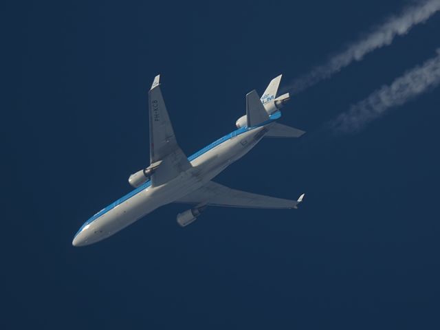 Boeing MD-11 (PH-KCB) - 3-1-2015. KLM Royal Dutch Airlines MD-11 (PH-KCB) Photographed 12-10-14 Crossing West Lancashire, England, UK @ FL360 working route Amsterdam-Montreal KLM671.br /br /br /This was one of the very last commercial flights by PH-KCB and I was lucky enough to see and photograph this fine aircraft just before it was retired from service just two weeks later.br /br /The KLM MD-11s were much loved by their crew,passengers and aviation enthusiasts worldwide. br /br /Pentax K-5.