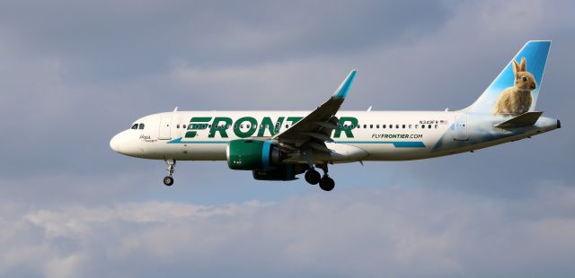 Airbus A320neo (N349FR) - About to touch down is this 2019 Frontier Airlines Airbus 320-251N with "Hops" the Rabbit getting the tail seat view in the Autumn of 2023.