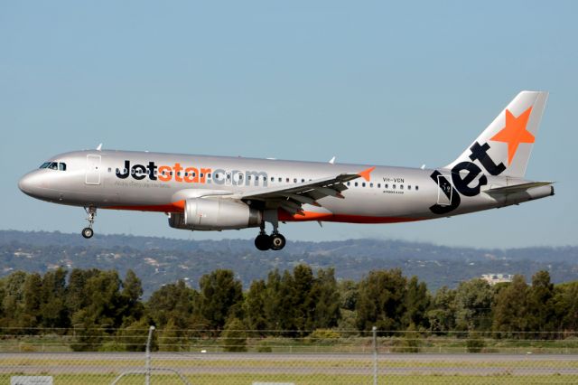 Airbus A320 (VH-VGN) - About to put down on runway 05. Wednesday, 21st May 2014.