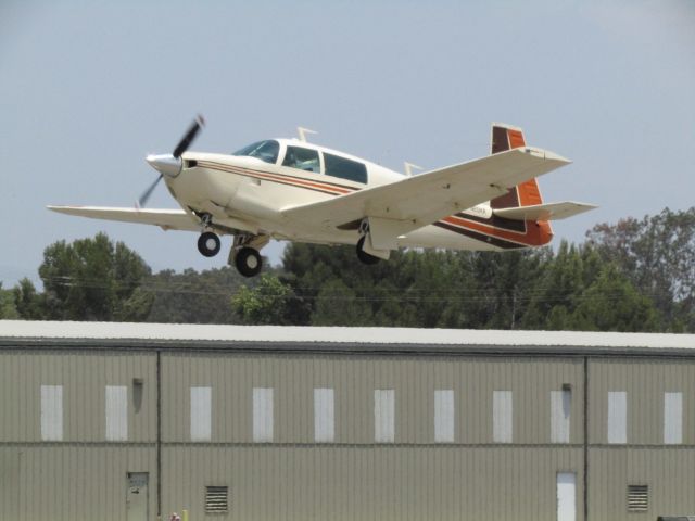 Mooney M-20 (N201KR) - Taking off RWY 24