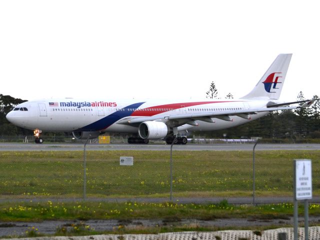 Airbus A330-300 (9M-MTC) - Rolling for take off on runway 05, for flight home to Kuala Lumpur, just before the arrival of a rain storm. Thursday 12th July 2012.