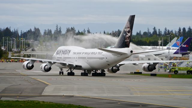 Boeing 747-400 (TF-AAK) - ABD666 ED FORCE ONE is welcomed by the Boeing Fire Dept as it taxis onto the Boeing North Ramp on 4/12/16. (ln 1325 / cn 32868). 