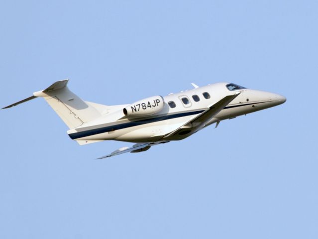 Embraer Phenom 100 (N784JP) - Take off runway 16.