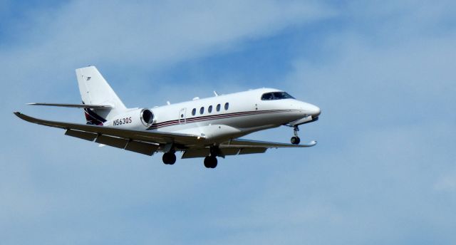 Cessna Citation Latitude (N563QS) - On short final is this 2017 Cessna Citation Latitude 680A in the Summer of 2022.
