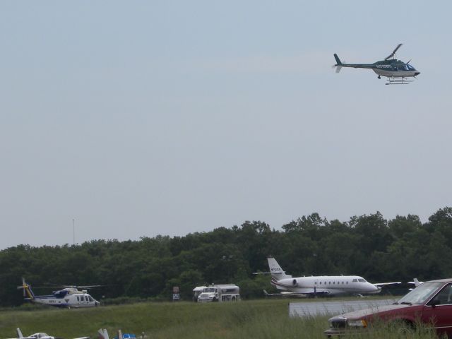 N8NJ — - N515BG leaving KBLM to take the place of N8NJ in the search for an armed suspect that did something very bad. Not sure what.