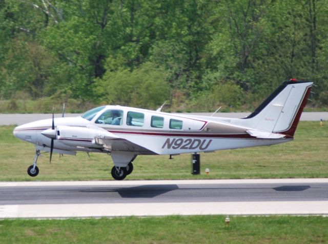 Beechcraft Baron (58) (N92DU) - WAHOO AVIATION INC departing from 20 at KJQF - 4/19/11