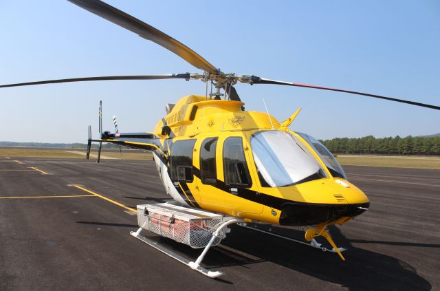 Bell 407 (N14HX) - A Helicopter Express Bell 407, contracted to the U.S. Forestry Service, on the ramp at Anniston Regional Airport, AL - October 5, 2019.