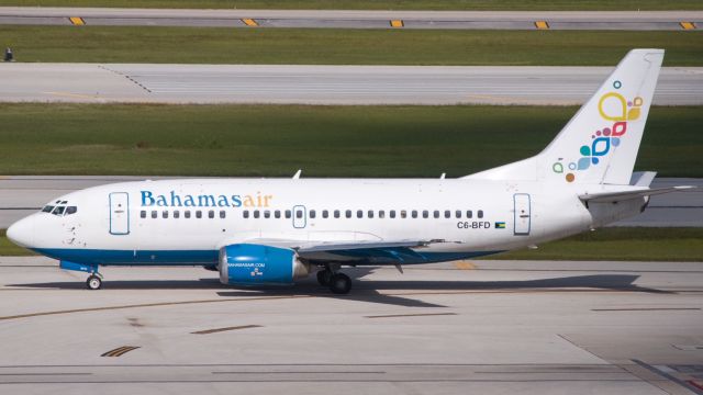 Boeing 737-500 (C6-BFD) - taxiing to the runway before departing to Nassau,Bahamas.