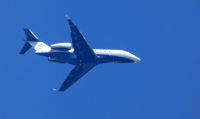 Bombardier Challenger 300 (N305DL) - Passing overhead is this 2016 Challenger BD-100-1A10 in the Spring of 2019.