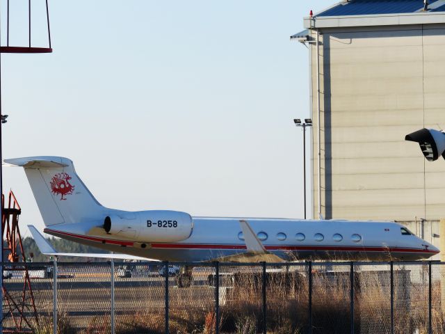 Gulfstream Aerospace Gulfstream V (B-8258) - I take a picture on Dec 18, 2016.br /It seems to be a scrap wood place, but its one corner of" international airport". Just in case..., (^^).