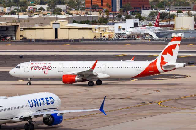 Airbus A321 (C-GJTX) - Air Canada Rouge A321 taxiing at PHX on 11/1/22. Taken with a Canon 850D and Tamron 70-200 G2 lens.