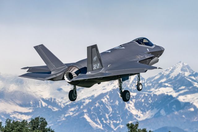 Lockheed F-35C (APJ7375) - landing with Italian alps behind the scene 