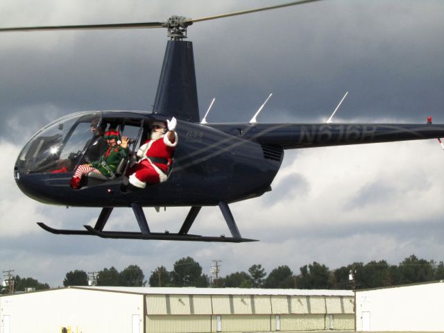 Robinson R-44 (N616R) - Santa and elf landing at KFUL