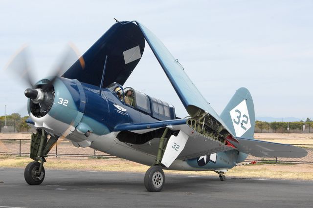 N92879 — - Running up the R-2600 radial engine with the wings folded.