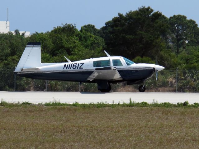 Mooney M-20 (N1161Z) - A fast aircraft. Roll out after landing runway 23.