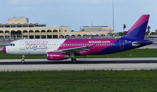 Airbus A320 (HA-LPW) - On departure RW31 in 'Pink Nose' 