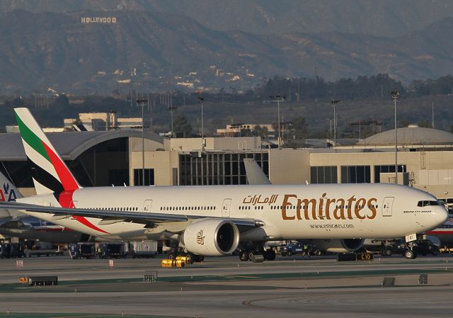 BOEING 777-300ER (A6-EGI) - Taxiing prior to the takeoff at the LAX.