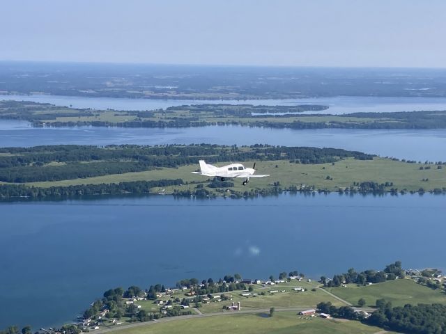 Beechcraft Sundowner (N6022S) - Flight near St Lawrence river.