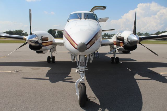 Beechcraft Airliner (N699CZ) - A 1968 model Beech 99, operated by Freight Runners Express, on the ramp at Thomas J. Brumlik Field, Albertville, AL - afternoon of August 11, 2020. 