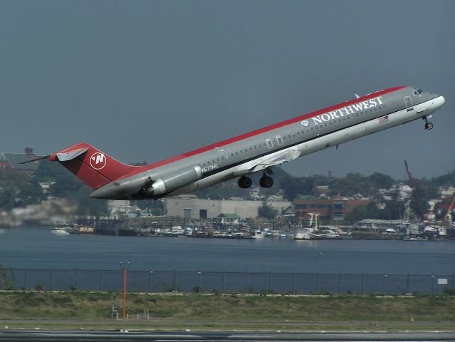 McDonnell Douglas DC-9-50 (N677MC) - NW DC-9-50 N677MC makes a very steep departure off Runway 13 at KLGA on Sept 13, 2005 wearing a less than pristine paint job. Built in 1977 this -50 has flown for Austrian, Muse Air, Eastern, Northwest, and is still flying the skies with Delta in 2011.