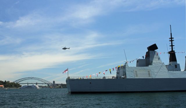 — — - International Fleet Review 2013. Sydney Harbour. HMS Daring a new British war ship. RAN Helicoptor in back ground