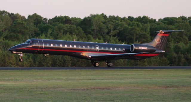 Embraer ERJ-145 (N138DE) - A Champion Air Embraer ERJ-145LR departing Boswell Field, Talladega Municipal Airport, AL, after the NASCAR GEICO 500 race at Talladega Super Speedway - very late in the afternoon, April 25, 2021.