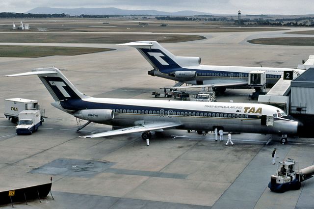 BELL-AGUSTA AB-139 (VH-TJK) - TRANS AUSTRALIA AIRLINES - TAA - McDONNELL DOUGLAS DC-9-31 - REG : VH-TJK (CN 47008/98) - TULLAMARINE MELBOURNE VIC. AUSTRALIA - YMML 4/4/1975 35MM SLIDE CONVERSION USING A LIGHTBOX AND A NIKON L810 DIGITAL CAMERA IN THE MACRO MODE.