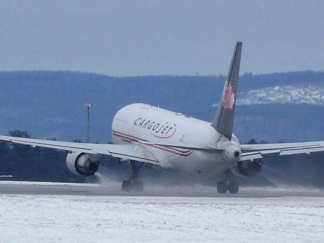 C-FGAJ — - taking off of #32, look at the thrust coming off those engines!