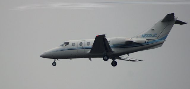 Beechcraft Beechjet (N602JC) - About to touch down is this 1999 Hawker Beechcraft 400XP in the Autumn of 2024.