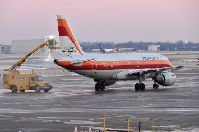 Airbus A319 (N742PS) - PSA Heritage jet getting deiced on 12-28-22