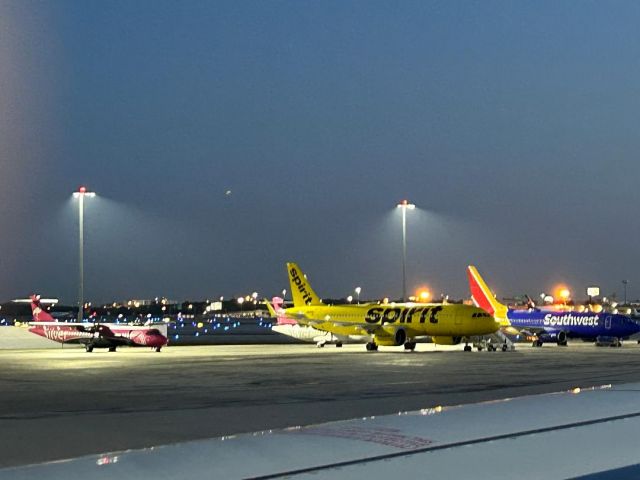 NXXX — - FLL Remote T3 parking, with a Spirit A320NEO, Southwest 737 and a pair of Silver ATRs all awaiting their next flights. 