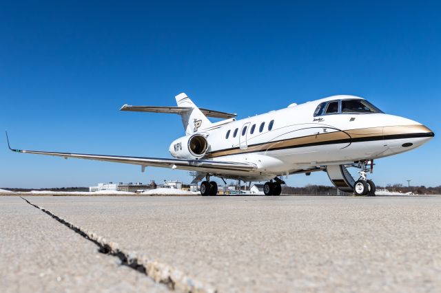 Hawker 800 (N1PU) - Purdue's Hawker 900XP preparing for a flight on a clear spring morning.